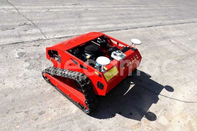 Tracked lawn mower
