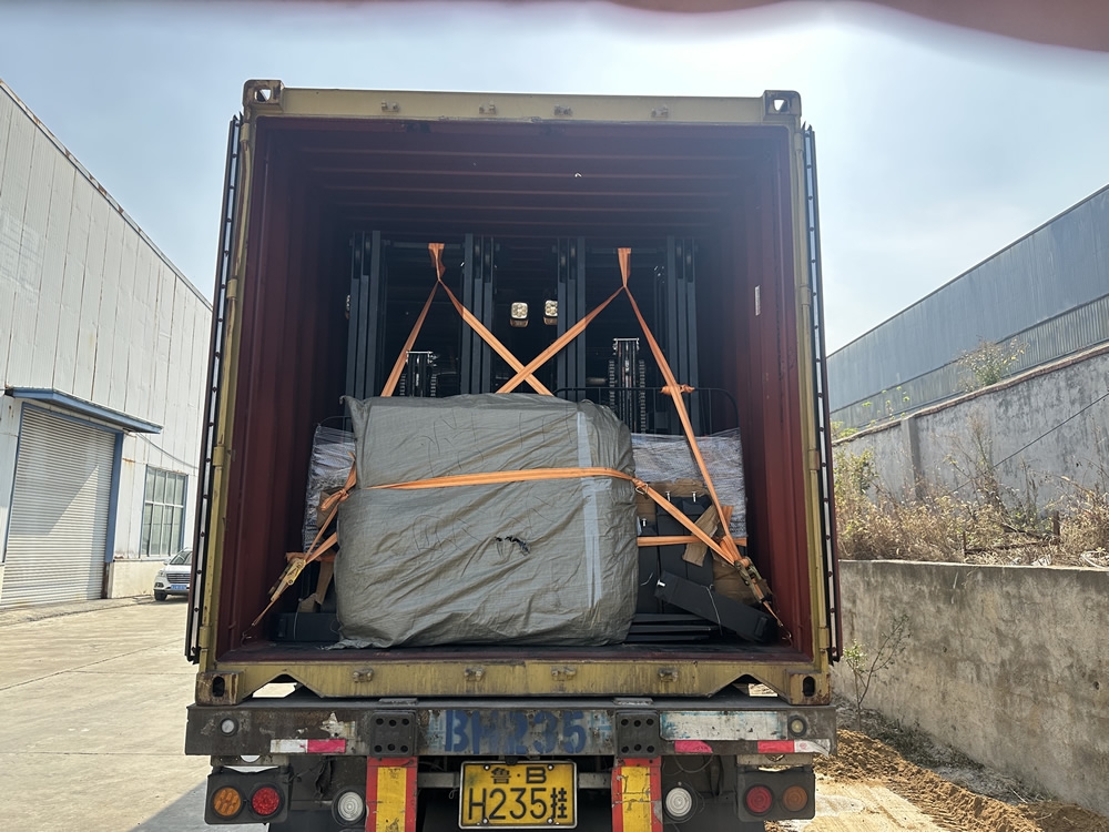 Electric forklifts secured inside a shipping container for export. Electric forklifts secured inside a shipping container for export.